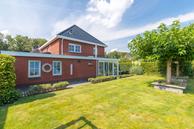 Historische woningfoto van Nicolaas Emmenstraat 1, Wildervank uit 2023