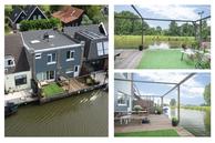 Historische woningfoto van Dorpsstraat 171, Oostknollendam uit 2022