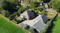 Historische woningfoto van Oosterstreek 54, Oosterstreek uit 2022