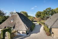 Historische woningfoto van Oosterstreek 54, Oosterstreek uit 2022