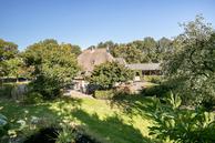 Historische woningfoto van Oosterstreek 54, Oosterstreek uit 2022