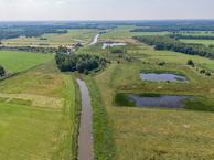 Historische woningfoto van Oosterstreek 32, Oosterstreek uit 2025