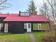 Historische woningfoto van De Bloemert 1-18, Midlaren uit 2022