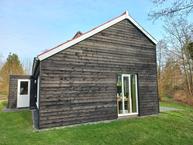 Historische woningfoto van De Bloemert 1-18, Midlaren uit 2022