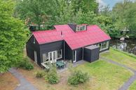 Historische woningfoto van De Bloemert 1-56, Midlaren uit 2022