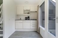 Historische woningfoto van De Bloemert 1-52, Midlaren uit 2023